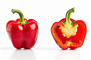 Ripe red whole pepper and half of pepper isolated on white backg, a Food & Drink Photo by AlyaAnd