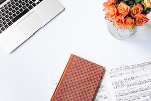 Book, flowers and sheet music