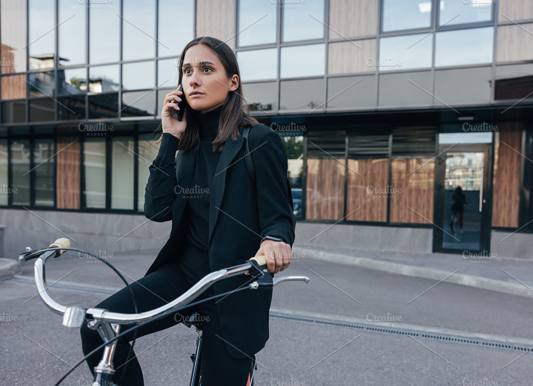 Businesswoman making a phone call, a Business Photo by Artem Varnitsin