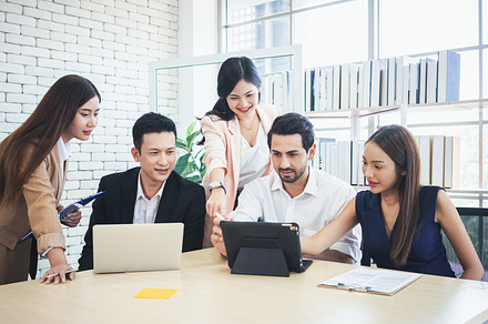 Successful business group working at the office, a Business Photo by Nednapa