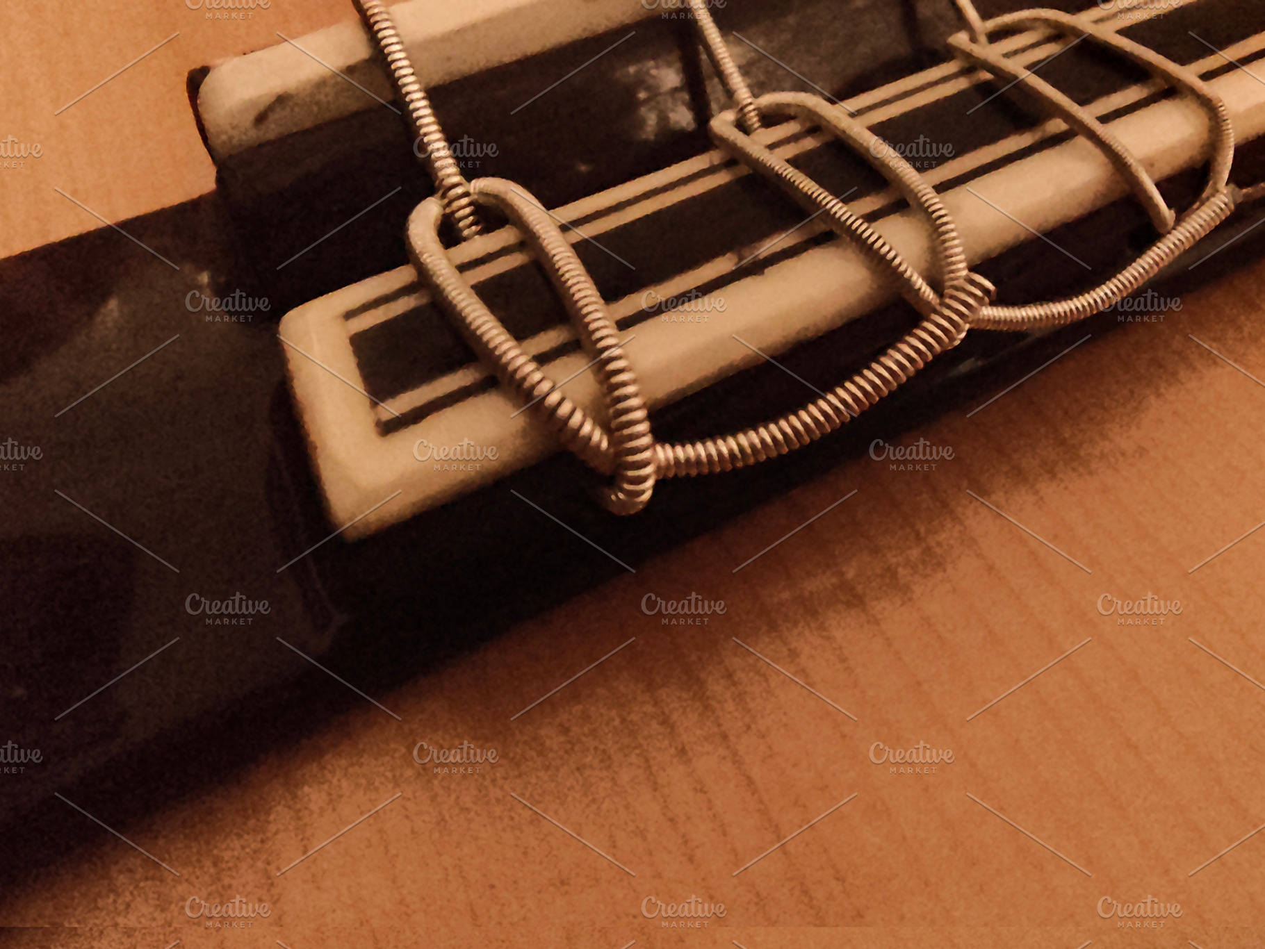 Close-up, high-angle detail shot of a classic spanish guitar, an Arts & Entertainment Photo by DanFLCreativo
