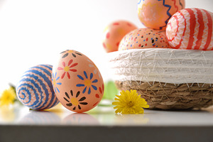 Colorful Hand-Painted Easter Eggs in Basket, a Holiday Photo by Davizro's Market