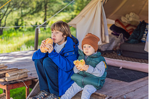 Toddler and his teenage brother, a Nature Photo by Elizaveta Galitskaya