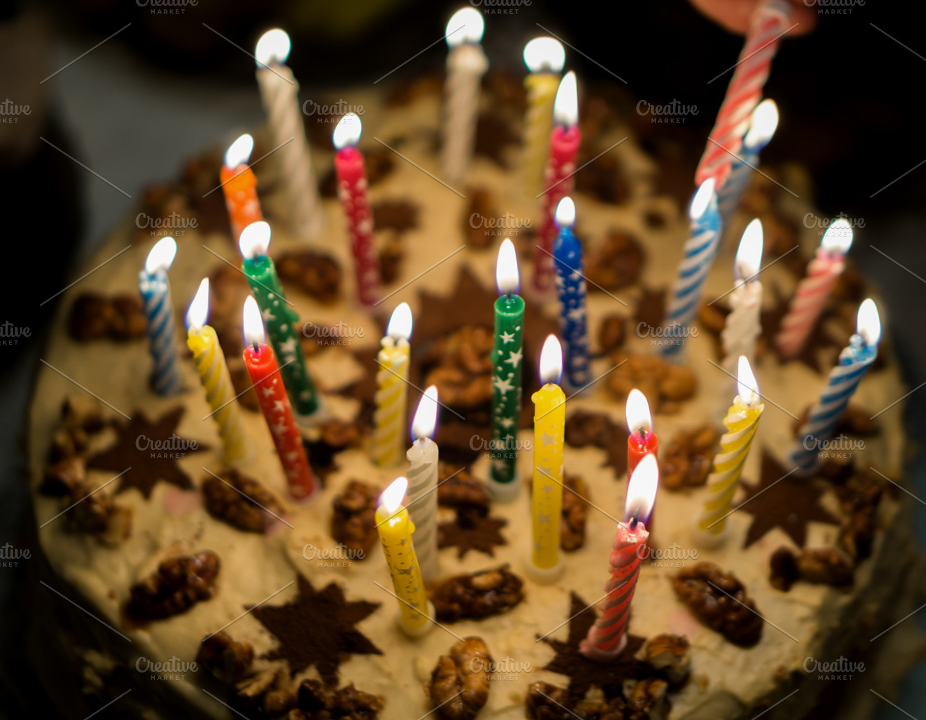 Birthday cake with burning candles featuring birthday, cake, and background, a Holiday Photo by PhotoVector