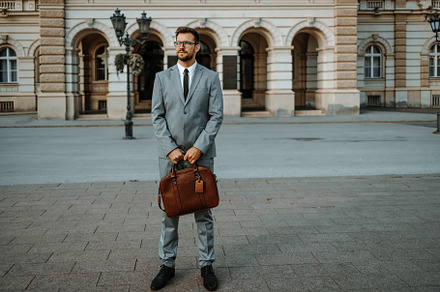 Businessman on street, a Person Photo by REDDOT Studio