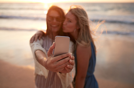 Woman friends taking selfie, a Person Photo by Jacob Lund