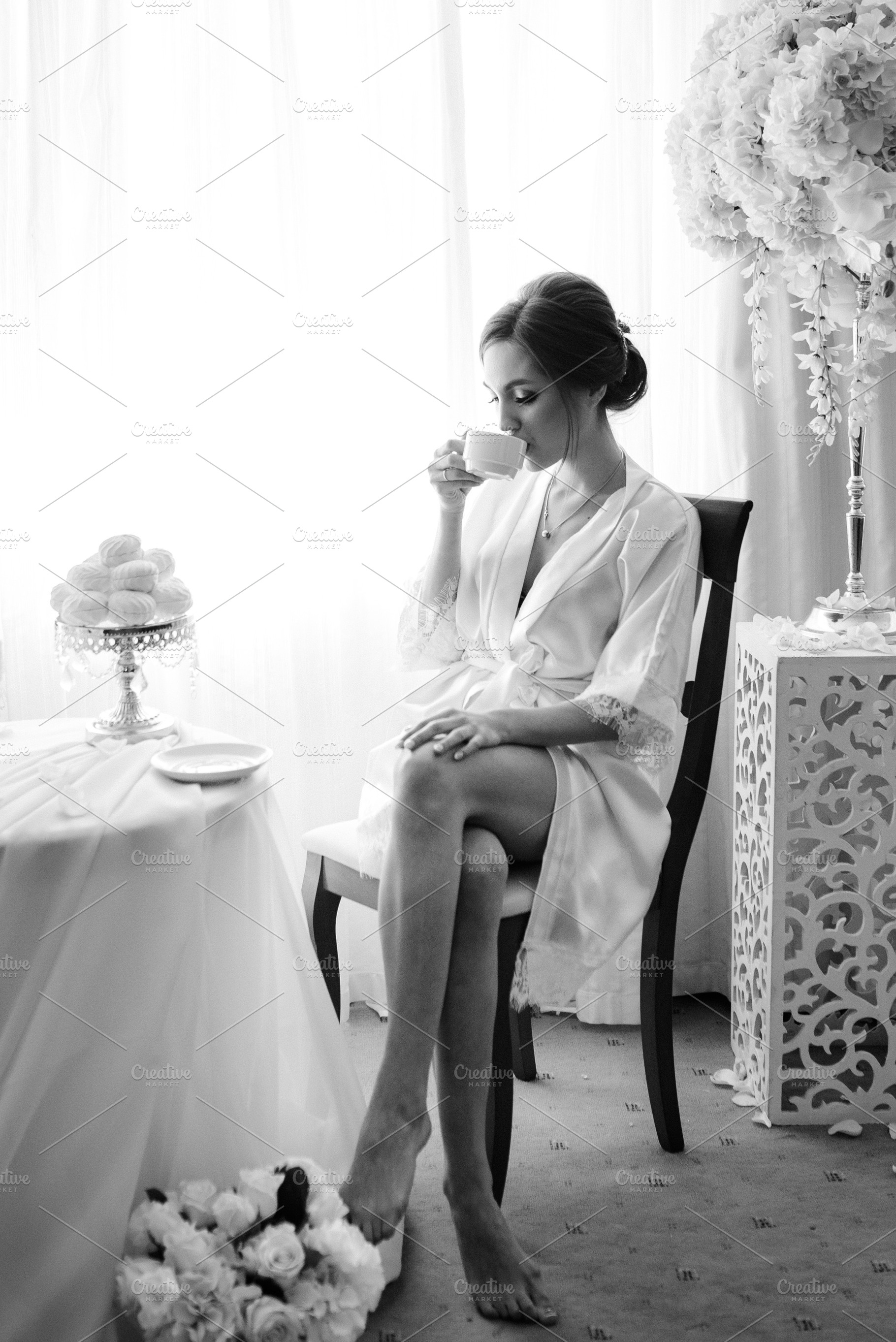 A young bride sits at a slot machine in the morning and drinks c, a Person Photo by Weddings, People, Travel