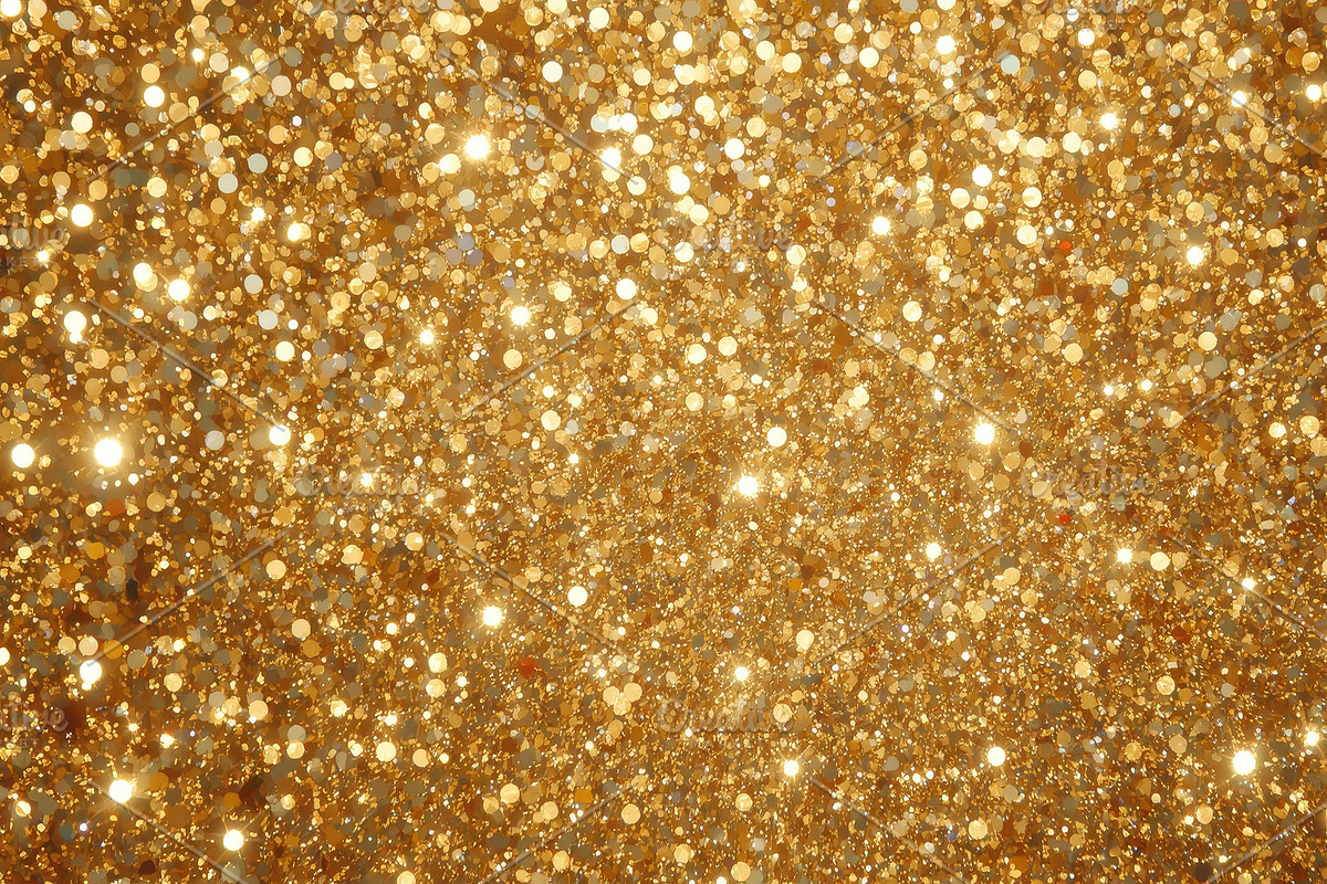 Glittering gold glitter particles, an Illustration by wavebreak