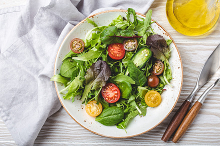 Vegetables vegetarian healthy salad with red yellow cherry tomat, a Background Photo by its_al_dente