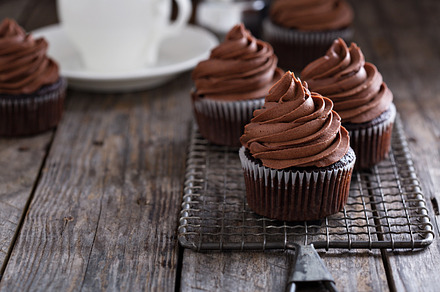 Chocolate cupcakes with whipped ganache containing chocolate, cupcakes, and, a Food & Drink Photo by farwasser