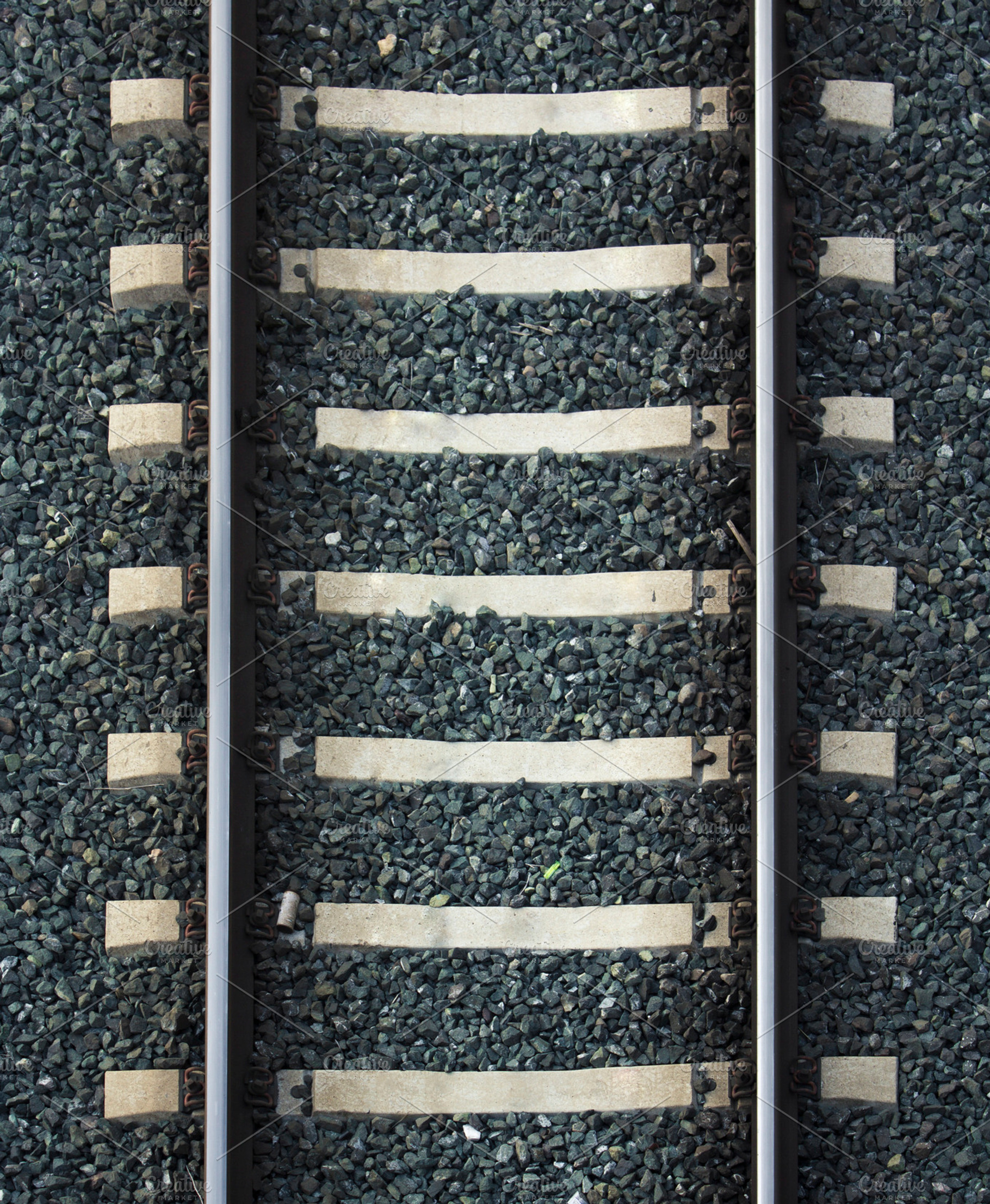 Railroad track stock photo containing railroad track and directly above, a Transportation Photo by Geasuha