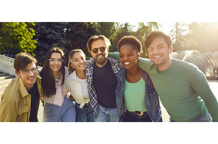 Outdoor group portrait of cheerful, a Person Photo by StudioRomantic