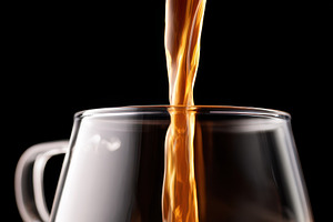 Pouring tea into a glass cup, a Food & Drink Photo by AlyaAnd
