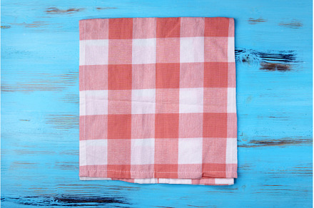 Empty red kitchen napkin on a blue, an Abstract Photo by darksoul72