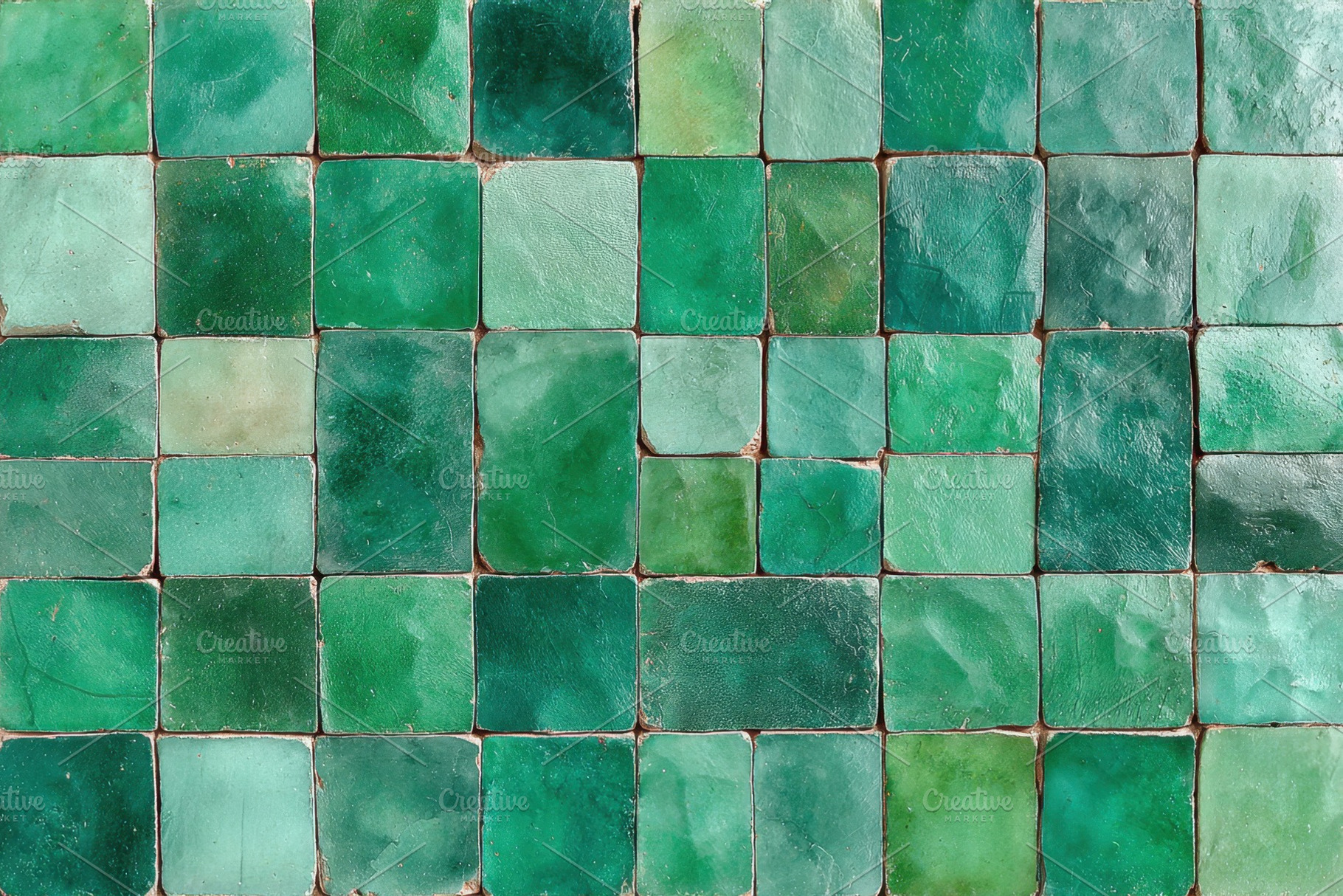 Textured green tile wall design, a Background Photo by AlyaAnd
