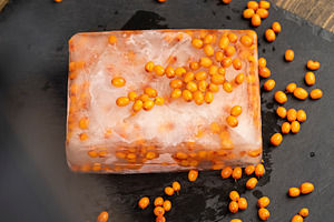 orange sea buckthorn berries for storage, ripe orange sea buckthorn berries dur, a Photo by rsoollAI
