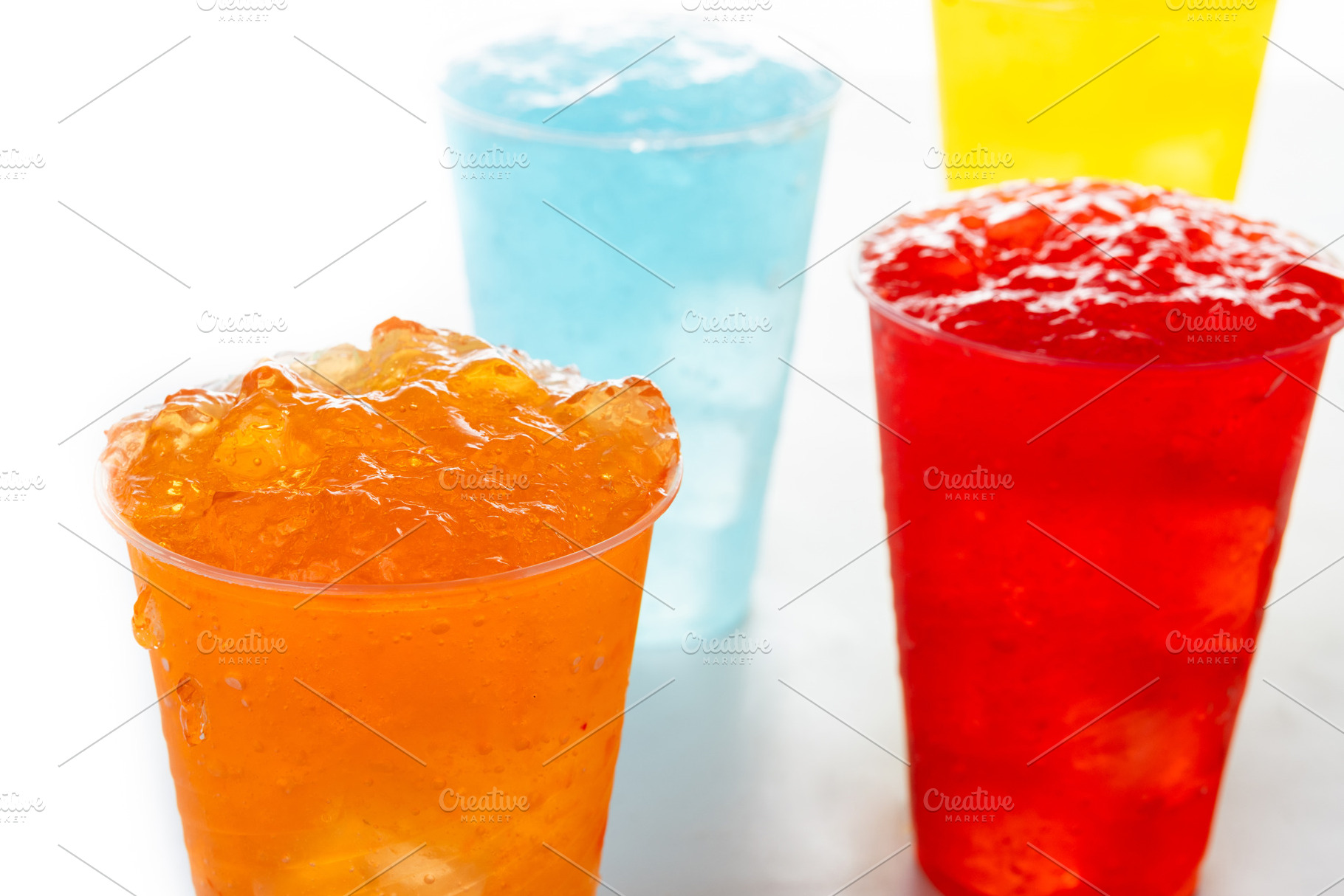 Colorful Frozen Slush Drinks in Plastic Cups, a Food & Drink Photo by etorres69