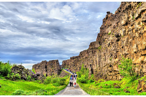 Road in a fissure between tectonic plates in the thingvellir national park, a Nature Photo by Leonid Andronov