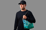 Canvas Tote Bag Mockup with Man, a Merchandise Mockup by graphypix (Thumbnail 1 of 4)