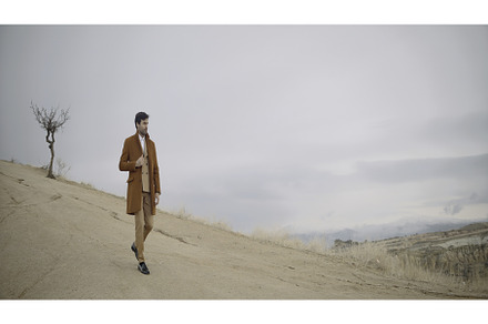 Elegant man walks on sand. Action, a Person Photo by Media Whale Stock