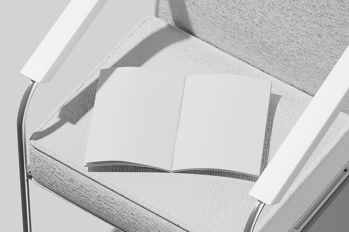 Brochure on Chair Mockup, a Merchandise Mockup by Unerispace (Photo 3 of 5)