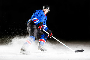Hockey player turning around skating containing ice hockey, alone, and hockey