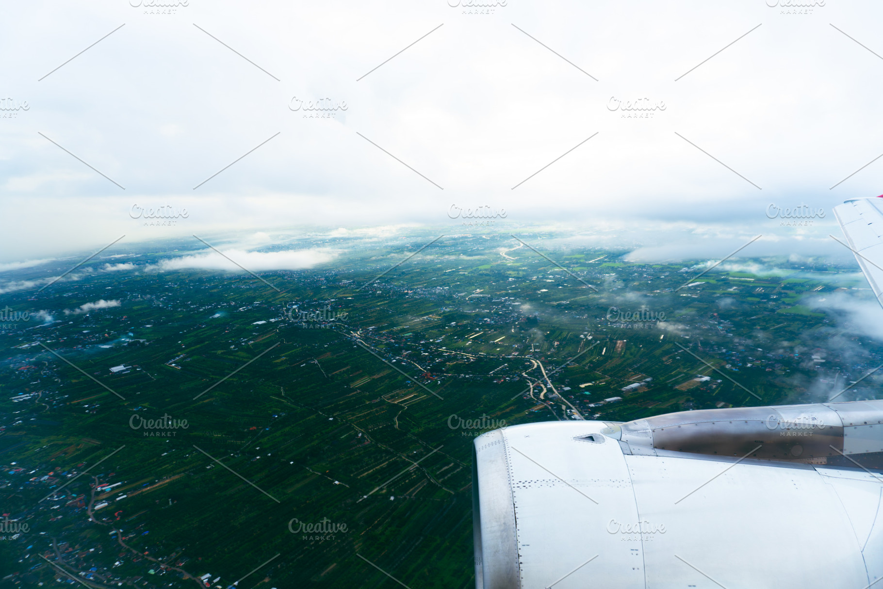 Aerial view of an airplane window, a Photo by AMMi