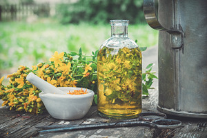 Hypericum flowers and oil bottle.