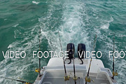 Motor boat with fishing tackles sailing in the ocean, a Graphic by Grey Coast Media (Thumbnail 1 of 2)