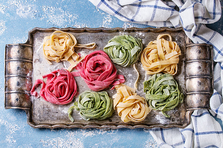 Colored fresh homemade pasta tagliatelle featuring pasta, fresh, and, a Food & Drink Photo by Natasha Breen