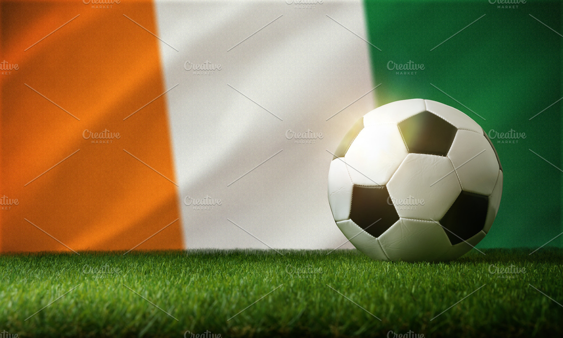 Soccer ball on grass with Ivory Coast flag, a Sports & Recreation Photo by Davizro's Market