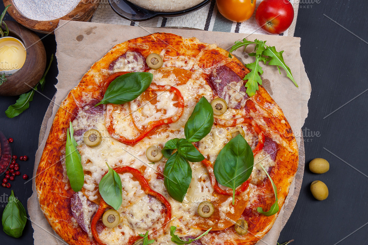 Delicious fresh pizza on dark, a Food & Drink Photo by eleana (Photo 2 of 3)