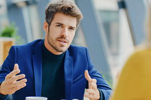 Young businessman in a blue suit, a Business Photo by MistyDay