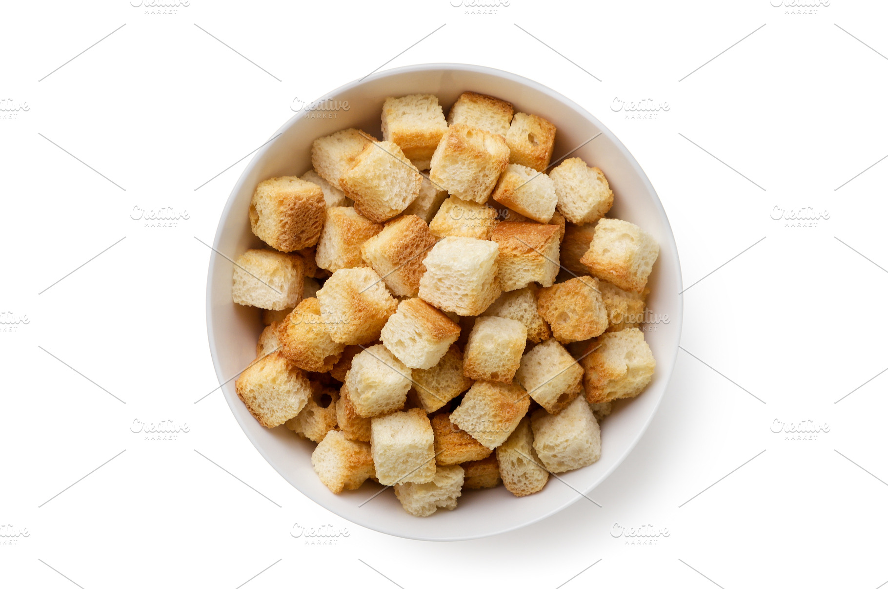 Bread croutons in a plate on a white, a Food & Drink Photo by innakreativ