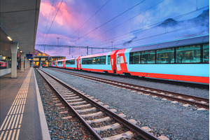 Red and blue modern passenger train, a Transportation Photo by den-belitsky