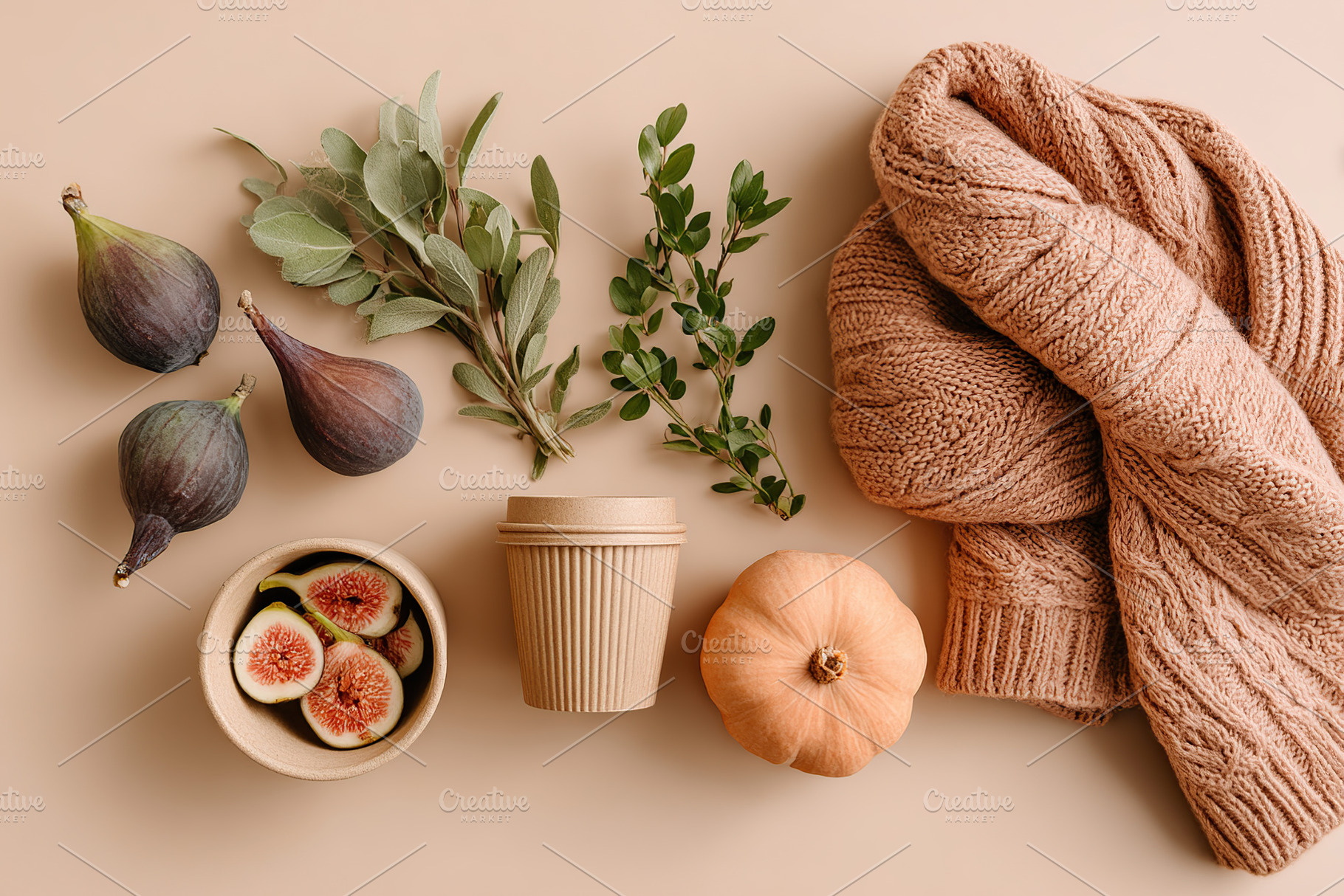 Reusable containers with fresh figs, herbs, and cozy knitwear on a neutral back, a Photo by AlyaAnd
