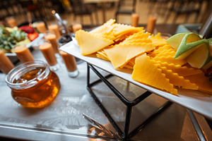 Cheddar cheese platter with garnish, a Food & Drink Photo by SkyNext