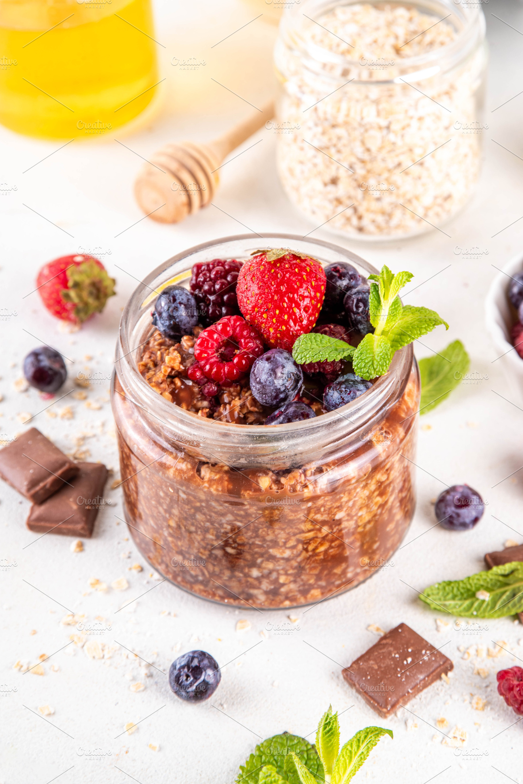 Chocolate Overnight Oatmeal, with chocolate sauce, nuts and fres, a Food & Drink Photo by Rimma