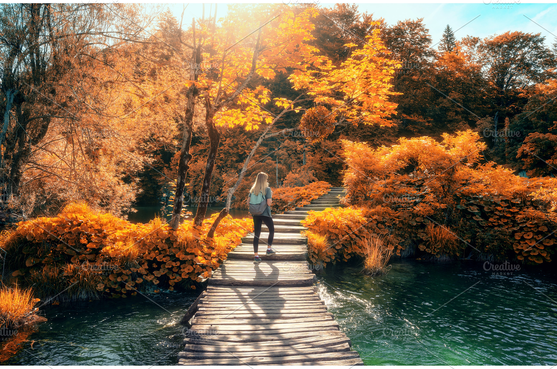 Woman with backpack walking on, a Nature Photo by den-belitsky