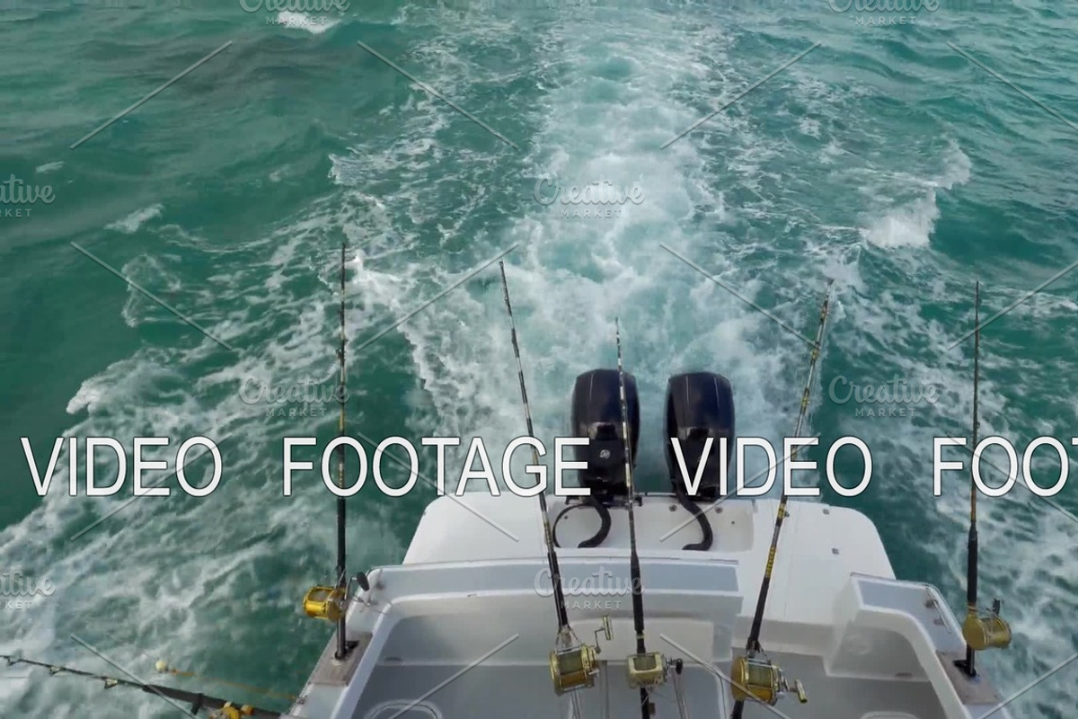 Motor boat with fishing tackles sailing in the ocean, a Graphic by Grey Coast Media (Photo 1 of 2)