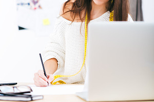 Designer containing woman, designer, and girl