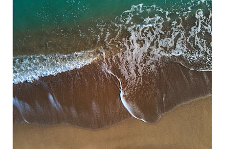 Aerial view of sandy beach and sea, a Nature Photo by IlliaBondarPhotography