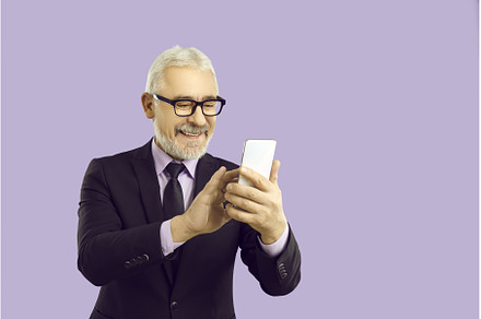 Cheerful elderly business man in, a Person Photo by StudioRomantic