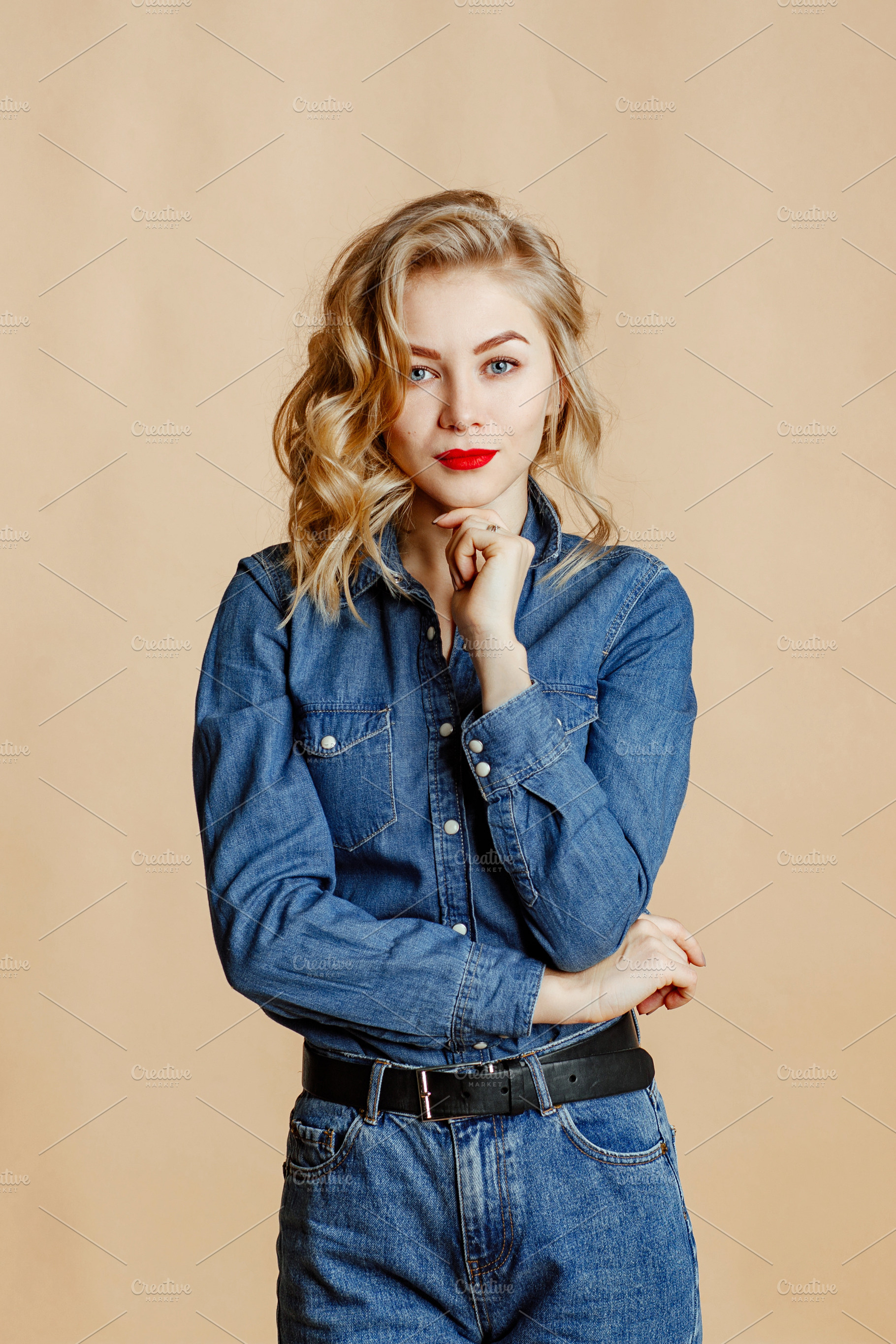 Blueeyed blonde in a jeans shirt featuring background, woman, and business, a Person Photo by Balchugova_photo
