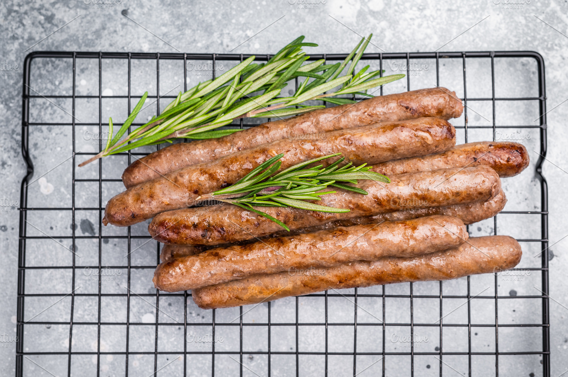 Flavorful grilled sausage links on a rack, inviting you to enjoy, a Food & Drink Photo by composter-box@mail.ru