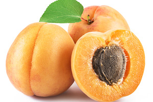 Ripe apricots isolated on the white, a Photo by Volff
