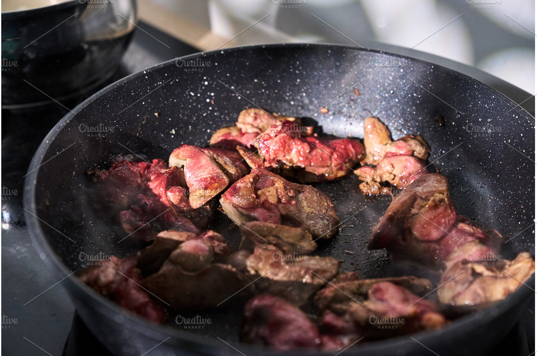 Cooking sliced liver with onions in, a Food & Drink Photo by darksoul72