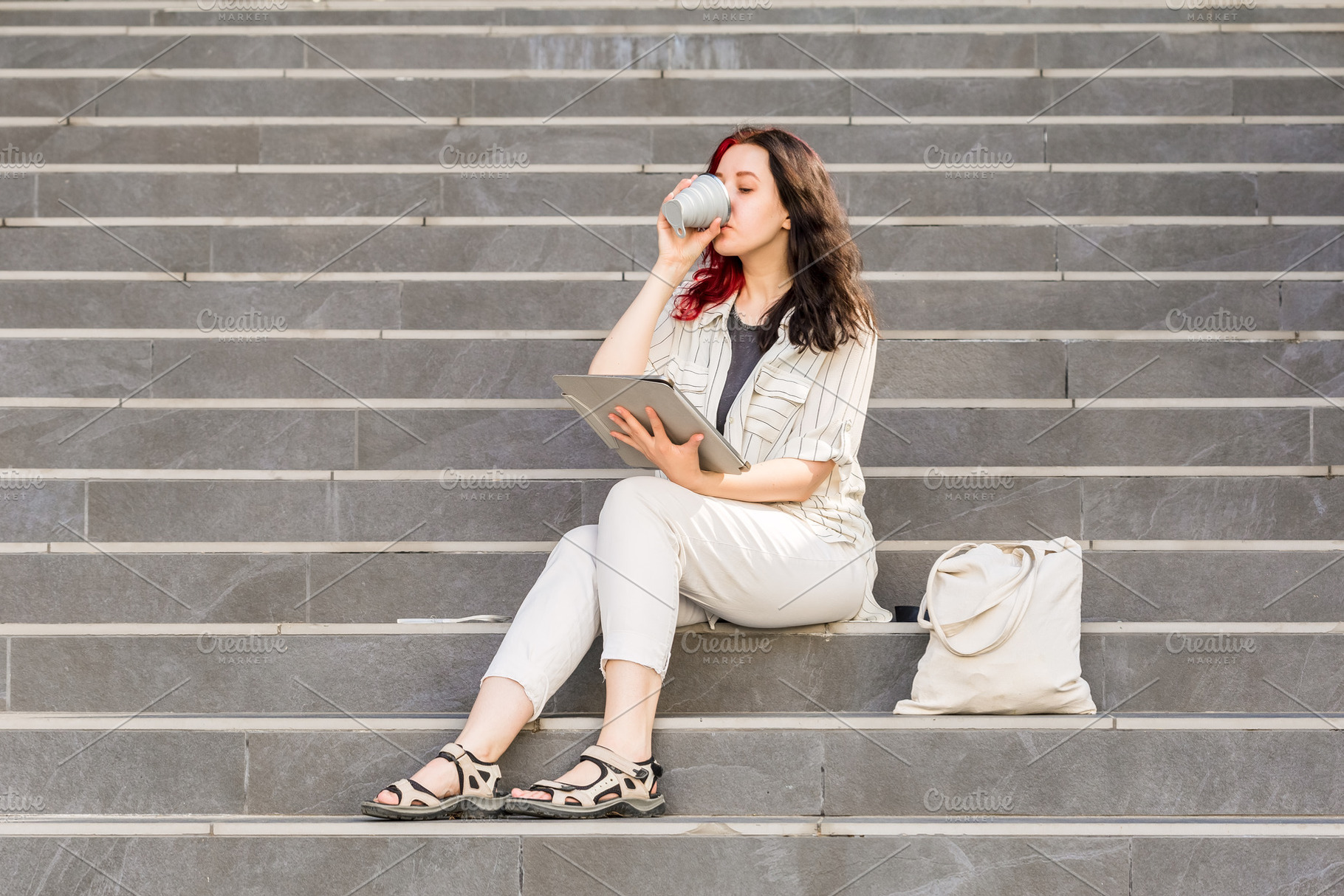 Woman having a coffee break, a Photo by Andriana Syvanych