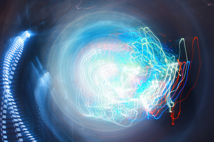 Neon light swirl traces abstract background