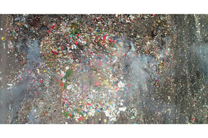 Smoke rising from burning garbage, an Industrial Photo by Goinyk
